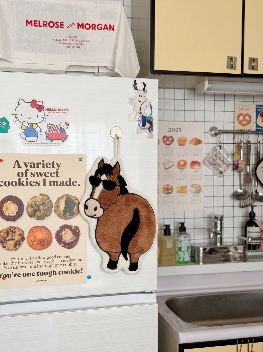 OFF SCRIPT Flattery cartoon horse absorbent hand towel hanging on a kitchen refrigerator, lifestyle usage shot